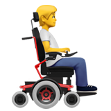 person i motorisert rullestol: vendt mot høyre